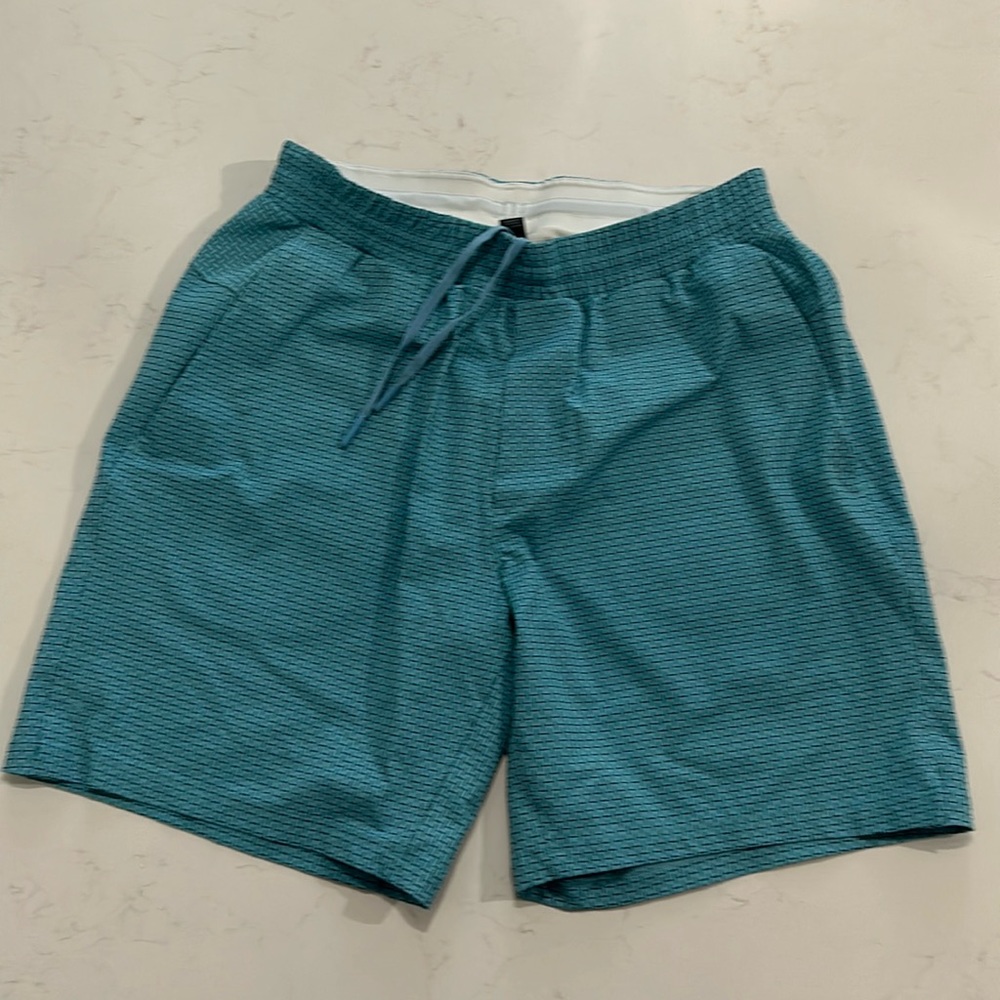Slightly used lulu M swimwear short with liner